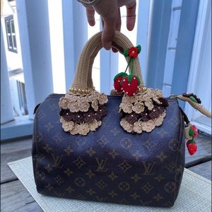 Louis Vuitton Speedy 25 Monogram.Good condition.